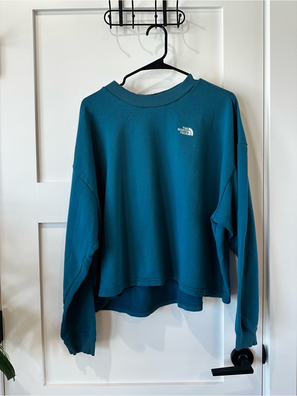 The North Face women's teal pullover sweatshirt